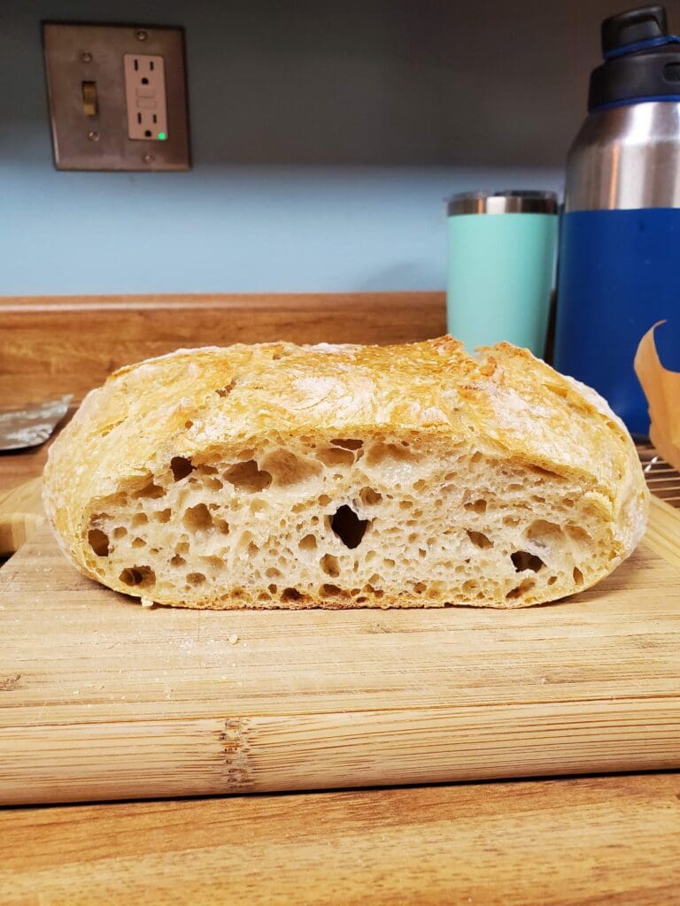 flat over proofed sourdough loaf